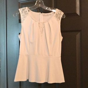 White peplum top